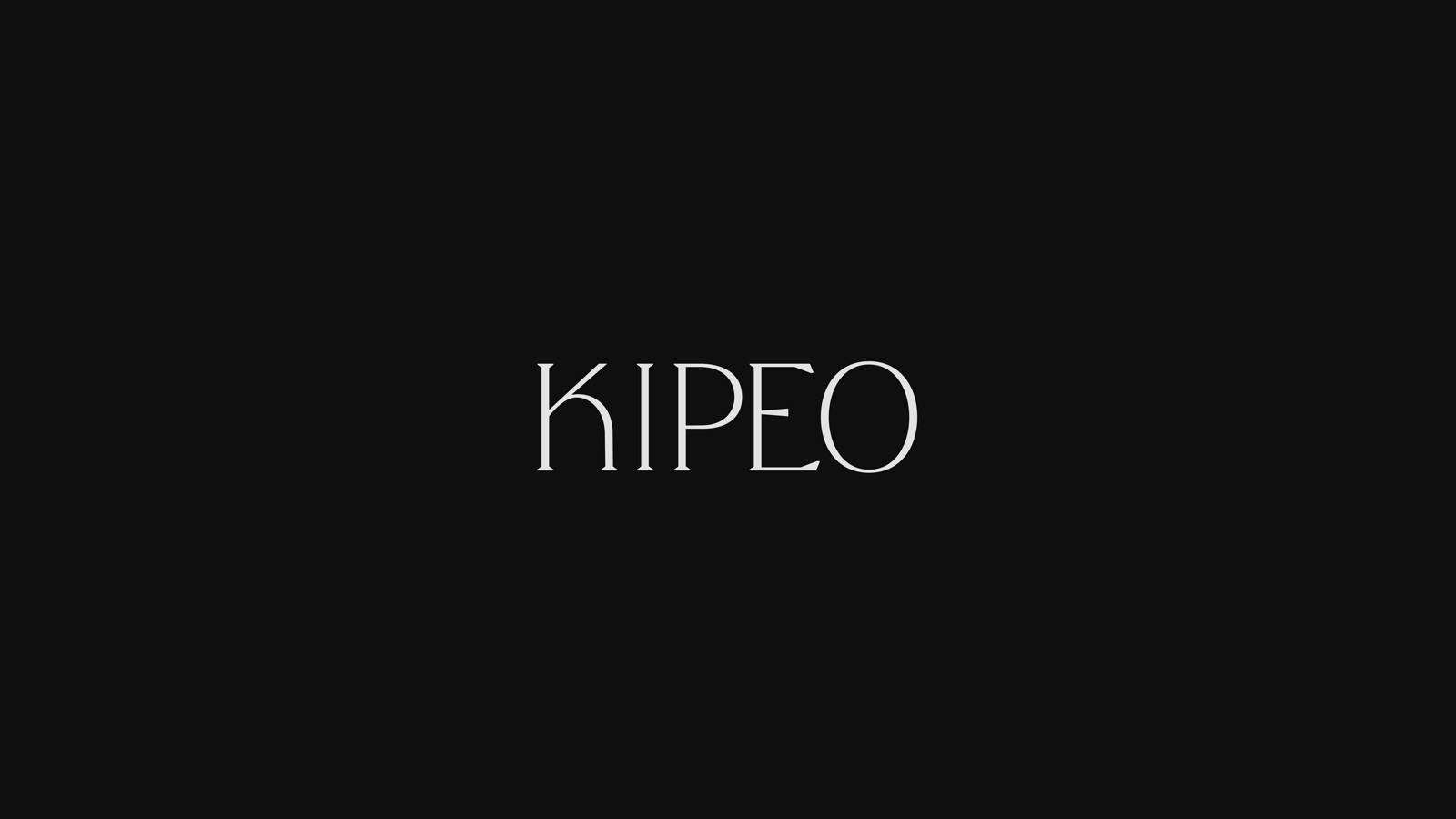 Lettrage Kipeo, version à empattements, en blanc sur fond noir